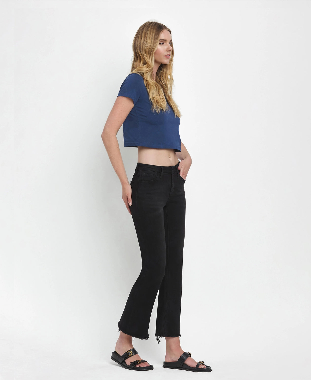 Mid Rise Raw Distressed Hem Crop Flare Jeans
