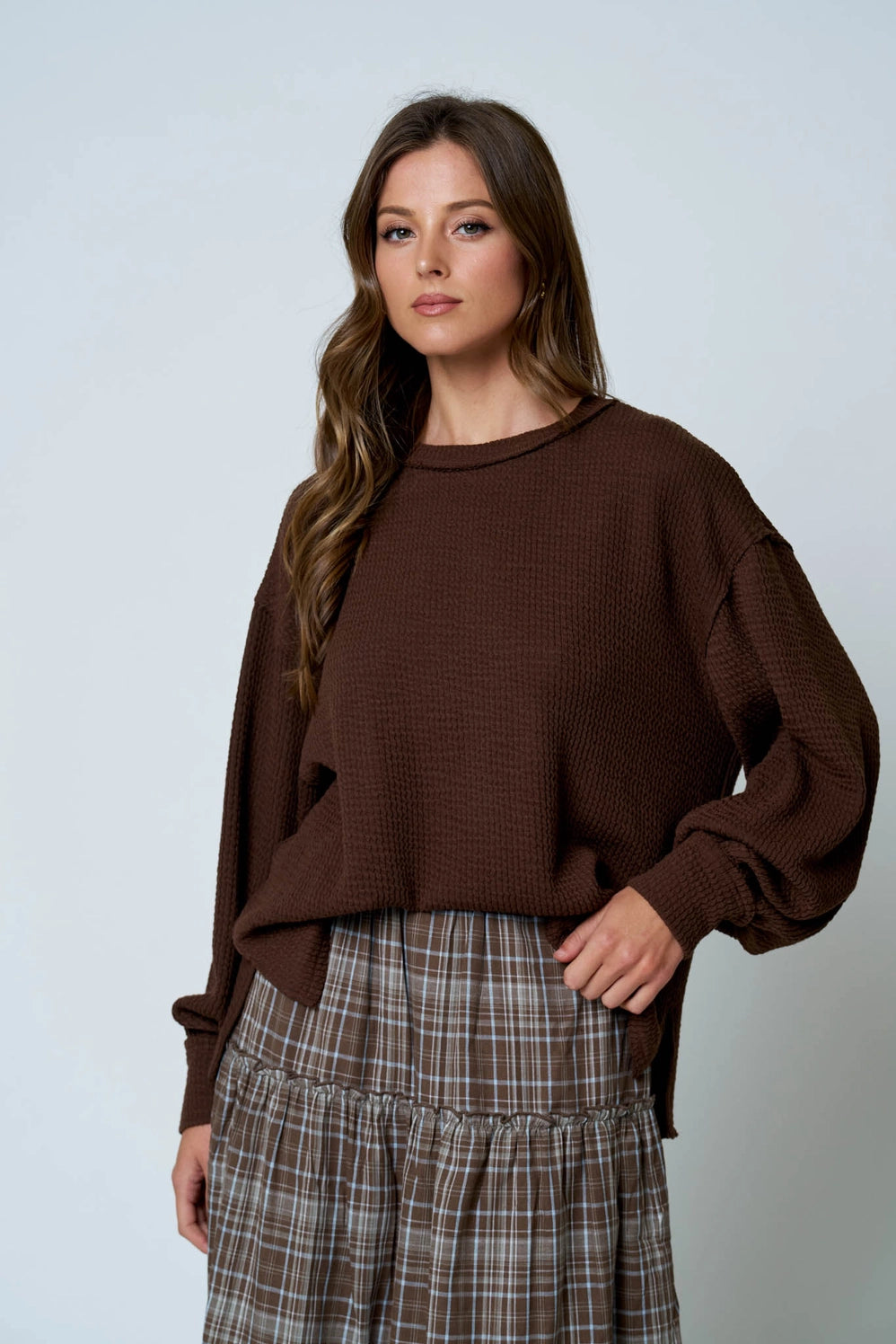 Textured Exposed Seam Sleeve Knit Top
