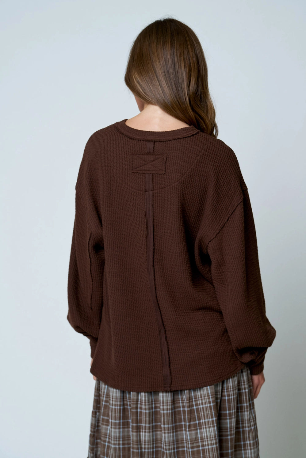 Textured Exposed Seam Sleeve Knit Top