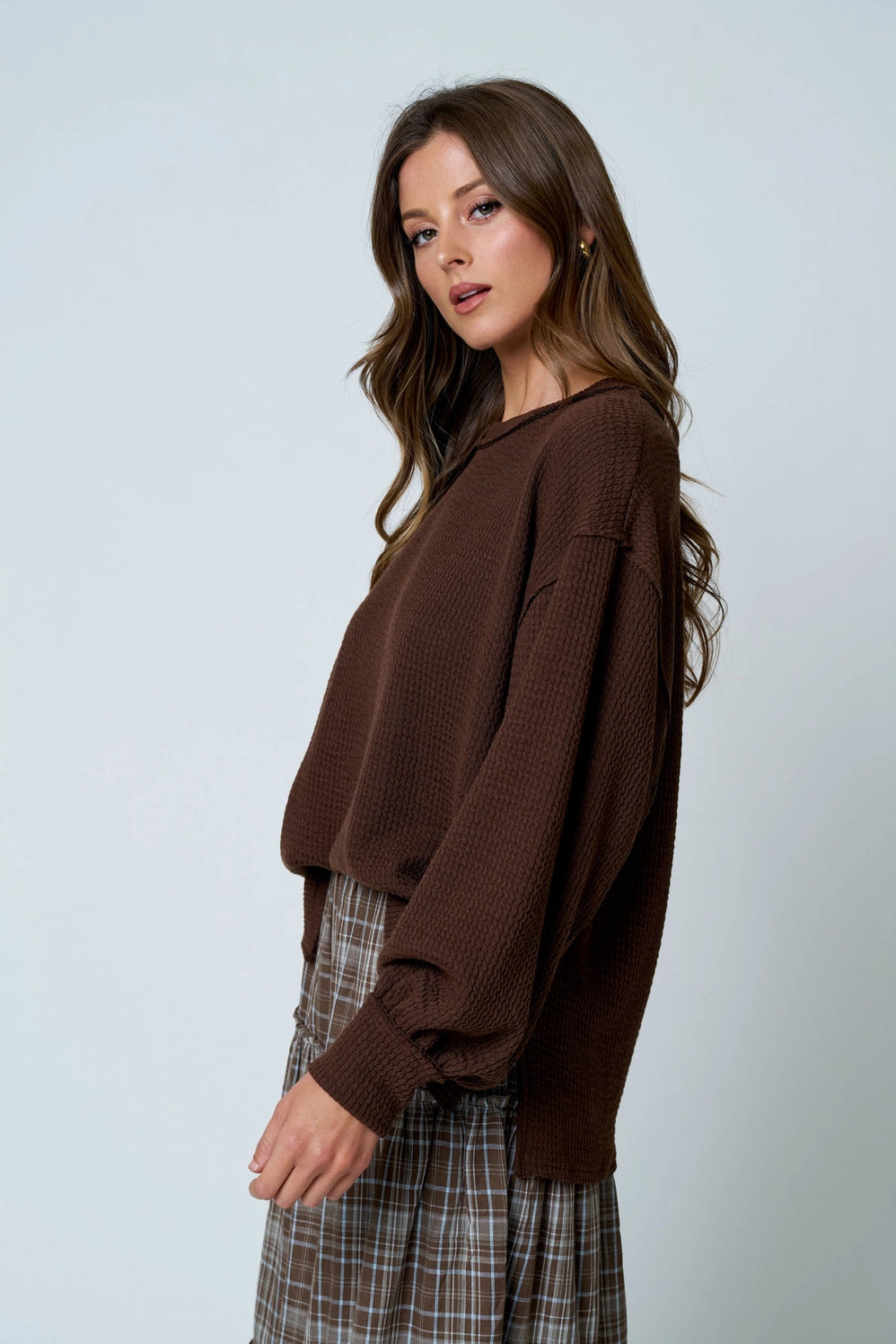 Textured Exposed Seam Sleeve Knit Top
