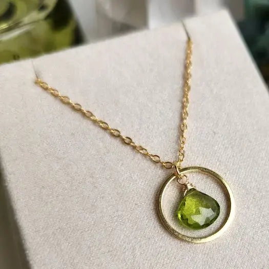 Peridot Inside Gold Circle Pendant Necklace